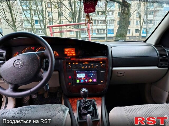 Серый Опель Омега, объемом двигателя 2.2 л и пробегом 290 тыс. км за 2600 $, фото 9 на Automoto.ua