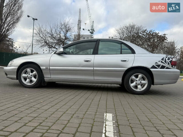 Серый Опель Омега, объемом двигателя 2.5 л и пробегом 192 тыс. км за 2800 $, фото 24 на Automoto.ua