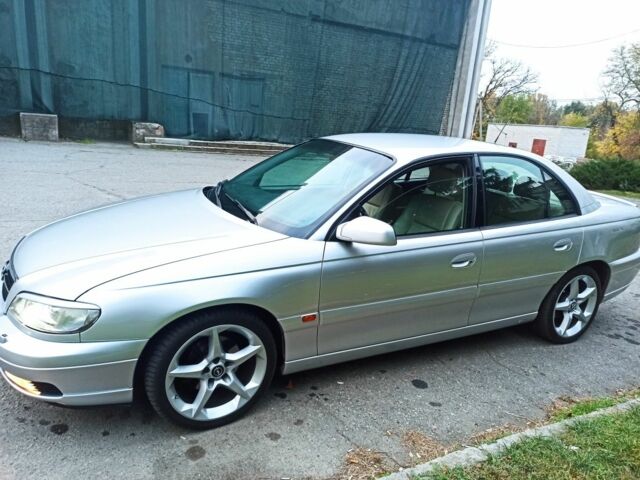 Серый Опель Омега, объемом двигателя 2.2 л и пробегом 250 тыс. км за 4700 $, фото 15 на Automoto.ua