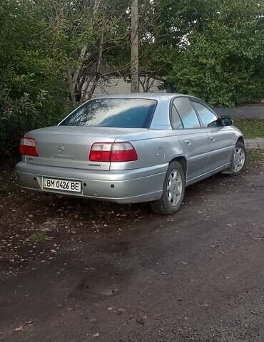 Серый Опель Омега, объемом двигателя 2.5 л и пробегом 185 тыс. км за 2950 $, фото 4 на Automoto.ua