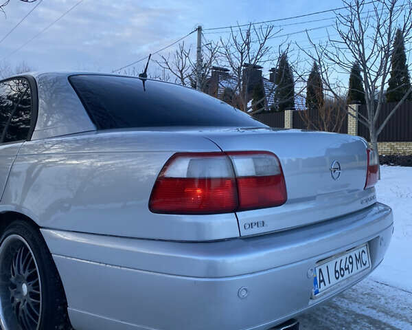 Сірий Опель Омега, об'ємом двигуна 3 л та пробігом 296 тис. км за 4000 $, фото 12 на Automoto.ua