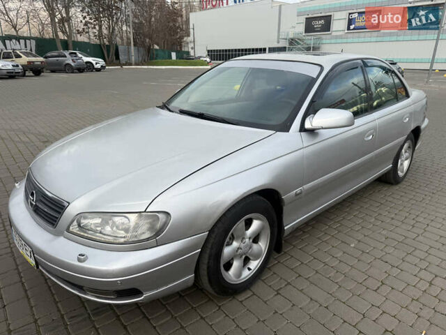 Серый Опель Омега, объемом двигателя 2.5 л и пробегом 192 тыс. км за 2800 $, фото 23 на Automoto.ua