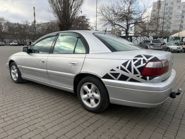 Сірий Опель Омега, об'ємом двигуна 2.5 л та пробігом 192 тис. км за 2800 $, фото 4 на Automoto.ua