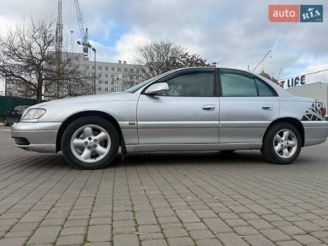 Сірий Опель Омега, об'ємом двигуна 2.5 л та пробігом 192 тис. км за 2750 $, фото 17 на Automoto.ua