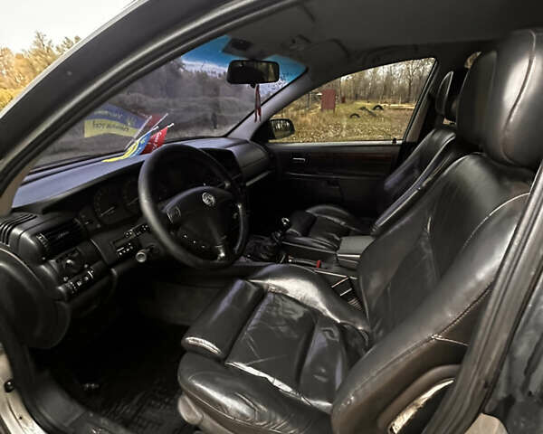 Серый Опель Омега, объемом двигателя 3 л и пробегом 225 тыс. км за 2153 $, фото 14 на Automoto.ua