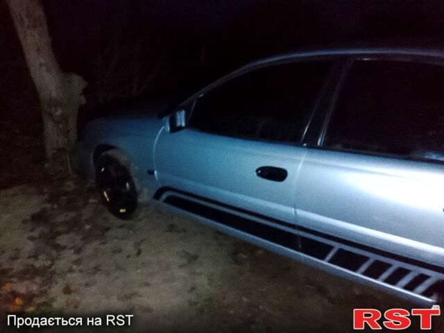 Сірий Опель Омега, об'ємом двигуна 2.2 л та пробігом 384 тис. км за 2000 $, фото 7 на Automoto.ua