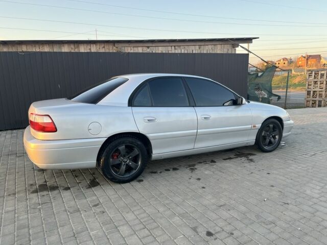 Серый Опель Омега, объемом двигателя 2 л и пробегом 370 тыс. км за 2600 $, фото 1 на Automoto.ua