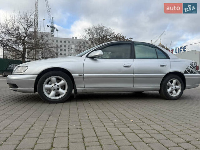 Серый Опель Омега, объемом двигателя 2.5 л и пробегом 192 тыс. км за 2800 $, фото 5 на Automoto.ua