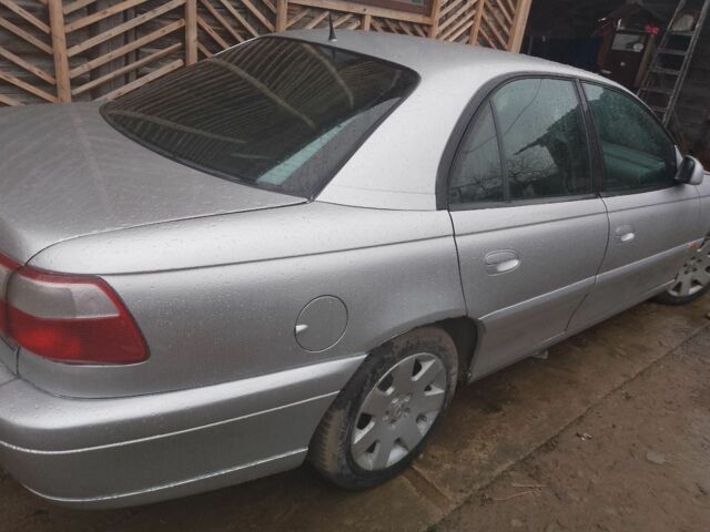 Серый Опель Омега, объемом двигателя 10 л и пробегом 150 тыс. км за 3500 $, фото 2 на Automoto.ua