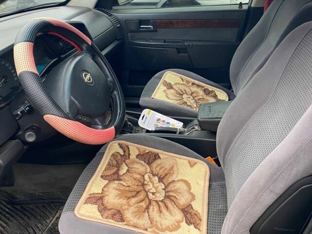 Серый Опель Омега, объемом двигателя 2.2 л и пробегом 111 тыс. км за 2600 $, фото 8 на Automoto.ua