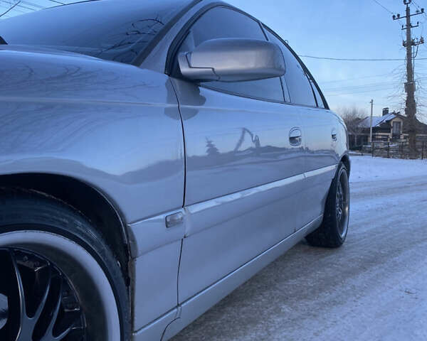 Сірий Опель Омега, об'ємом двигуна 3 л та пробігом 296 тис. км за 4000 $, фото 7 на Automoto.ua