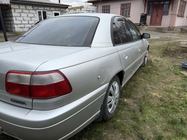 Сірий Опель Омега, об'ємом двигуна 2 л та пробігом 300 тис. км за 4699 $, фото 4 на Automoto.ua