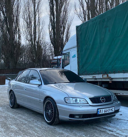 Сірий Опель Омега, об'ємом двигуна 3 л та пробігом 296 тис. км за 4000 $, фото 41 на Automoto.ua