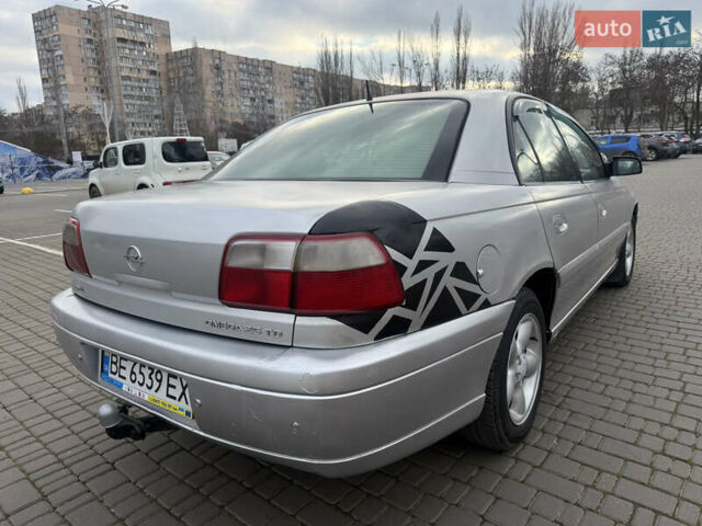Серый Опель Омега, объемом двигателя 2.5 л и пробегом 192 тыс. км за 2800 $, фото 14 на Automoto.ua