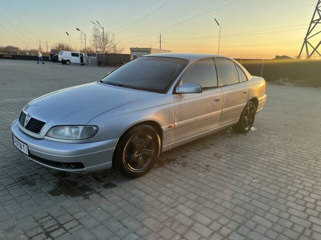 Серый Опель Омега, объемом двигателя 2 л и пробегом 370 тыс. км за 2600 $, фото 2 на Automoto.ua