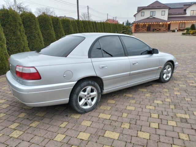 Серый Опель Омега, объемом двигателя 2.5 л и пробегом 320 тыс. км за 2400 $, фото 2 на Automoto.ua