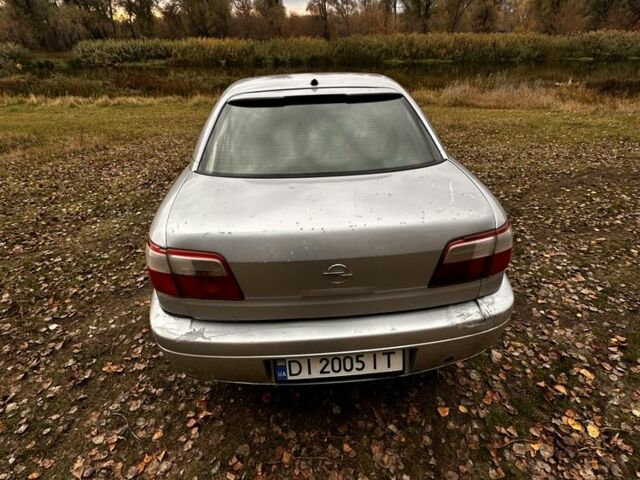 Серый Опель Омега, объемом двигателя 2.5 л и пробегом 225 тыс. км за 2158 $, фото 5 на Automoto.ua