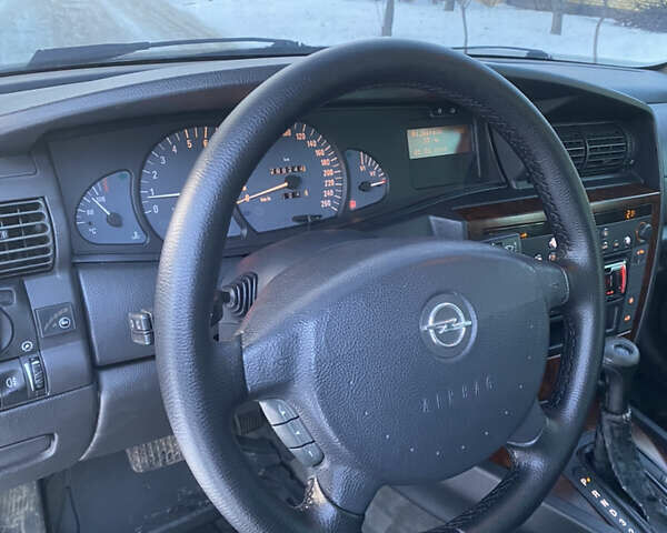 Сірий Опель Омега, об'ємом двигуна 3 л та пробігом 296 тис. км за 4000 $, фото 33 на Automoto.ua