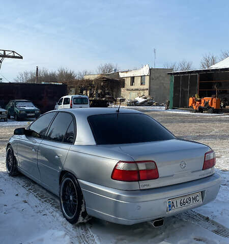 Сірий Опель Омега, об'ємом двигуна 3 л та пробігом 296 тис. км за 4000 $, фото 42 на Automoto.ua