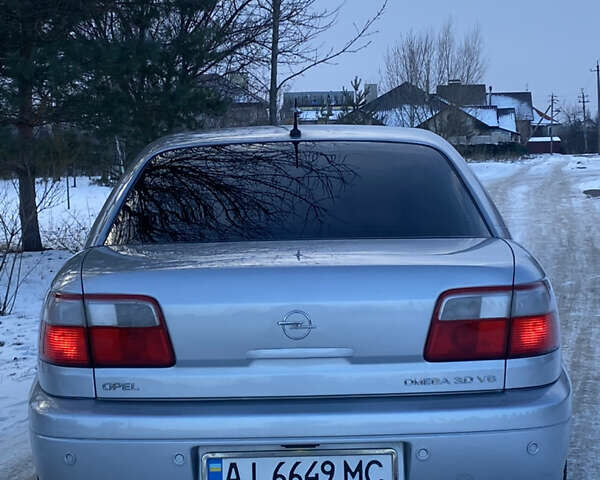 Сірий Опель Омега, об'ємом двигуна 3 л та пробігом 296 тис. км за 4000 $, фото 13 на Automoto.ua