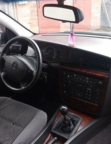 Серый Опель Омега, объемом двигателя 2.5 л и пробегом 185 тыс. км за 2950 $, фото 6 на Automoto.ua