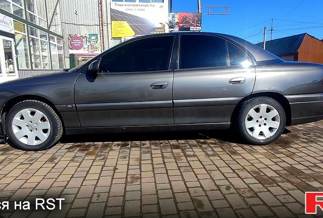 Сірий Опель Омега, об'ємом двигуна 2 л та пробігом 390 тис. км за 3850 $, фото 15 на Automoto.ua