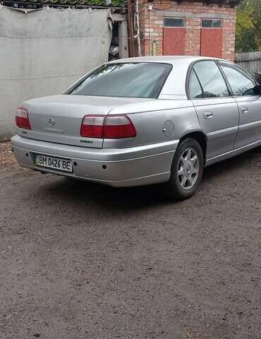 Серый Опель Омега, объемом двигателя 2.5 л и пробегом 185 тыс. км за 2950 $, фото 10 на Automoto.ua