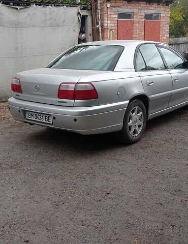 Сірий Опель Омега, об'ємом двигуна 2.5 л та пробігом 187 тис. км за 3300 $, фото 9 на Automoto.ua