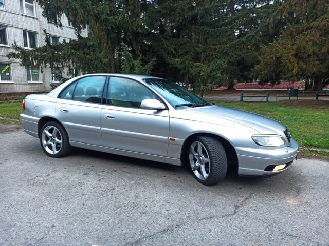 Серый Опель Омега, объемом двигателя 2.2 л и пробегом 250 тыс. км за 4700 $, фото 11 на Automoto.ua