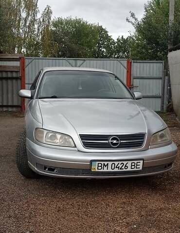 Серый Опель Омега, объемом двигателя 2.5 л и пробегом 185 тыс. км за 2950 $, фото 2 на Automoto.ua