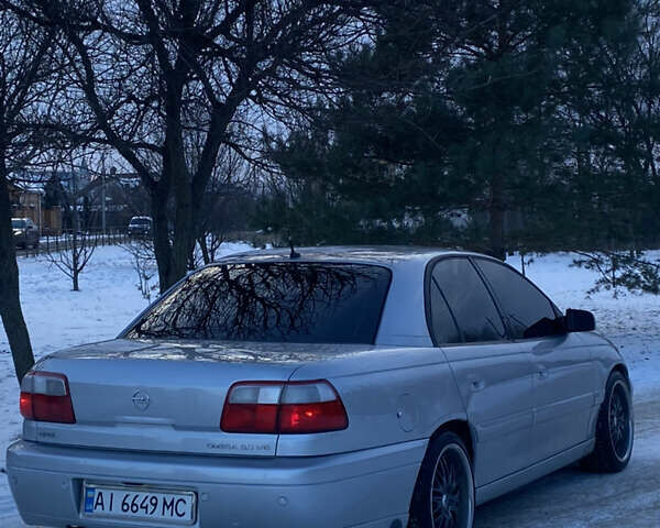 Сірий Опель Омега, об'ємом двигуна 3 л та пробігом 296 тис. км за 4000 $, фото 14 на Automoto.ua