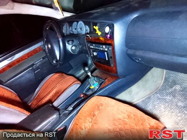 Сірий Опель Омега, об'ємом двигуна 2.2 л та пробігом 384 тис. км за 2000 $, фото 6 на Automoto.ua