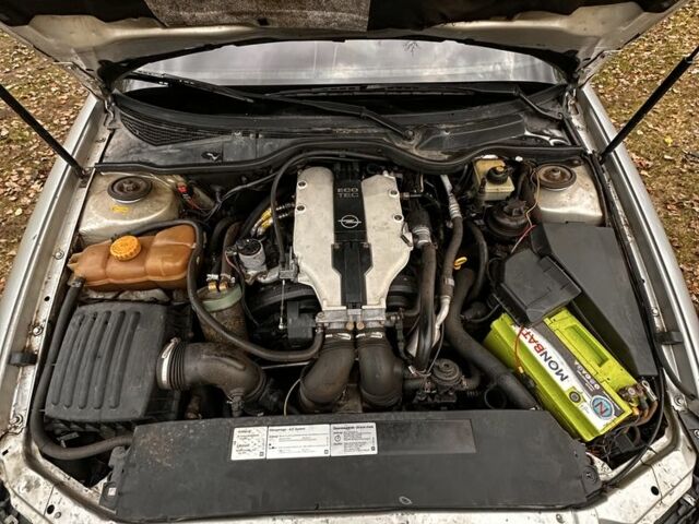 Серый Опель Омега, объемом двигателя 2.5 л и пробегом 225 тыс. км за 2158 $, фото 1 на Automoto.ua