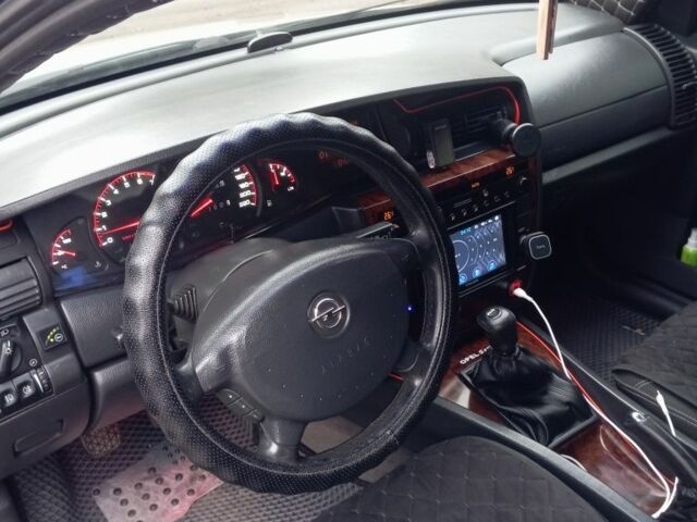 Серый Опель Омега, объемом двигателя 2 л и пробегом 380 тыс. км за 3000 $, фото 3 на Automoto.ua
