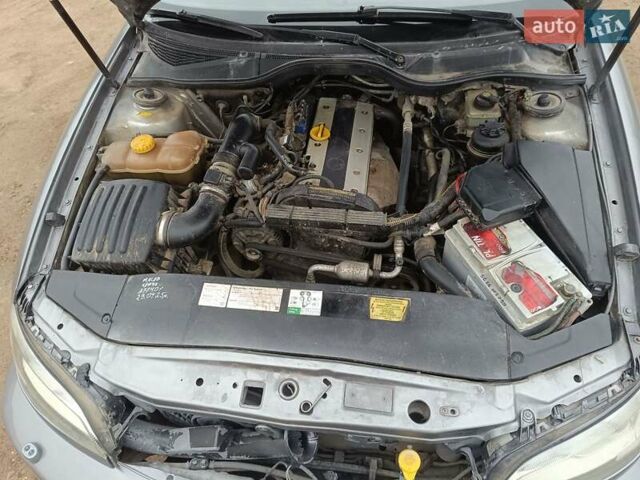 Серый Опель Омега, объемом двигателя 2.2 л и пробегом 379 тыс. км за 2800 $, фото 12 на Automoto.ua