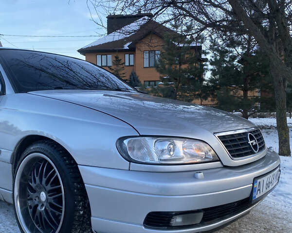 Сірий Опель Омега, об'ємом двигуна 3 л та пробігом 296 тис. км за 4000 $, фото 1 на Automoto.ua