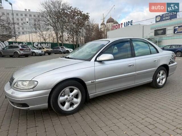 Сірий Опель Омега, об'ємом двигуна 2.5 л та пробігом 192 тис. км за 2750 $, фото 18 на Automoto.ua