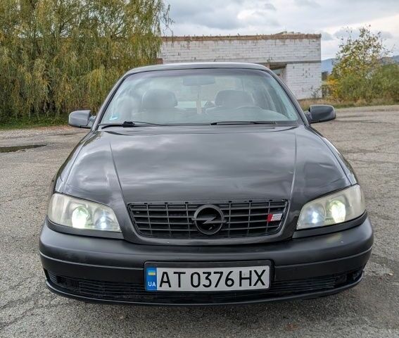 Сірий Опель Омега, об'ємом двигуна 3 л та пробігом 377 тис. км за 1898 $, фото 7 на Automoto.ua