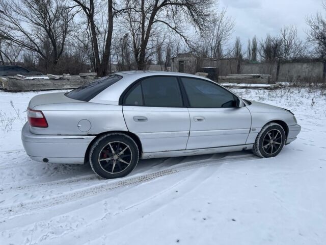 Сірий Опель Омега, об'ємом двигуна 2.2 л та пробігом 300 тис. км за 1900 $, фото 1 на Automoto.ua