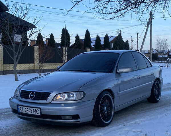 Сірий Опель Омега, об'ємом двигуна 3 л та пробігом 296 тис. км за 4000 $, фото 5 на Automoto.ua