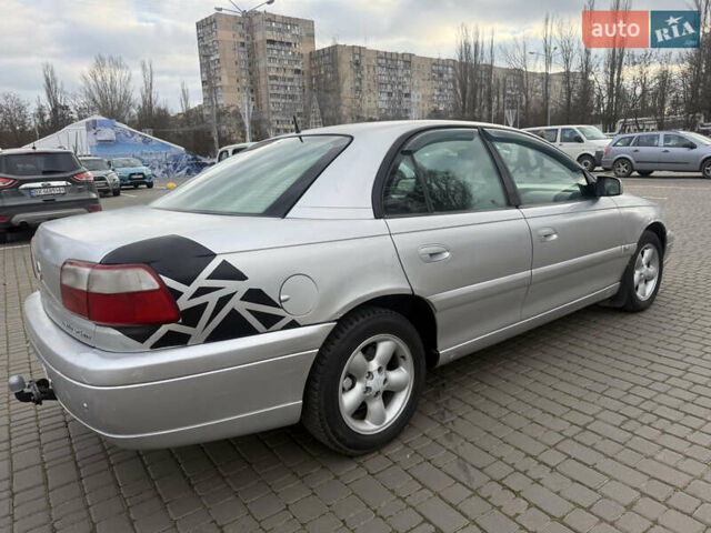 Серый Опель Омега, объемом двигателя 2.5 л и пробегом 192 тыс. км за 2800 $, фото 12 на Automoto.ua