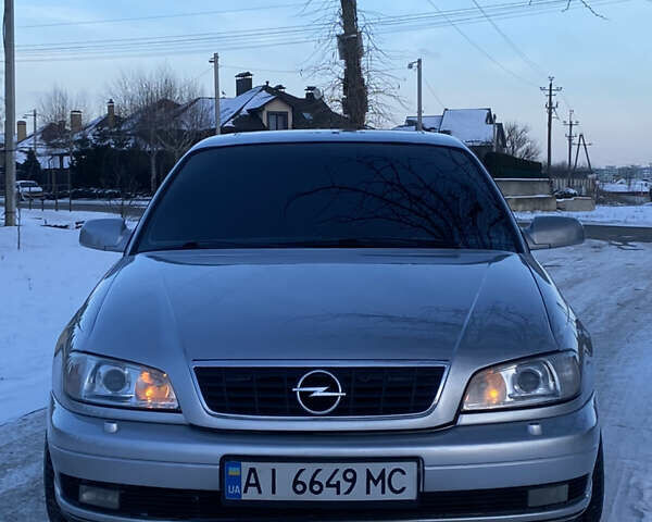 Сірий Опель Омега, об'ємом двигуна 3 л та пробігом 296 тис. км за 4000 $, фото 4 на Automoto.ua