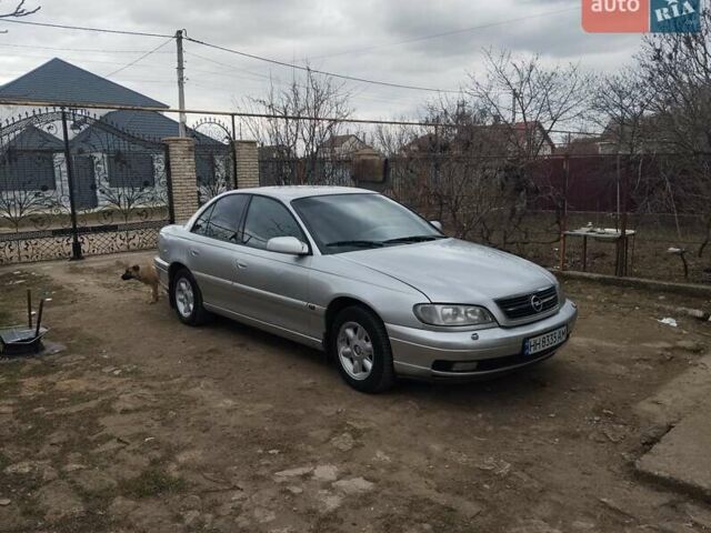 Серый Опель Омега, объемом двигателя 2.5 л и пробегом 358 тыс. км за 2500 $, фото 1 на Automoto.ua