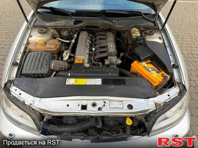 Серый Опель Омега, объемом двигателя 2.5 л и пробегом 192 тыс. км за 2800 $, фото 11 на Automoto.ua