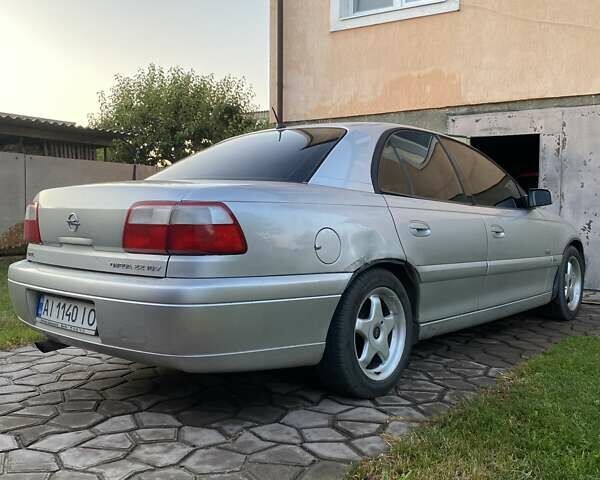 Сірий Опель Омега, об'ємом двигуна 2.2 л та пробігом 372 тис. км за 3200 $, фото 5 на Automoto.ua