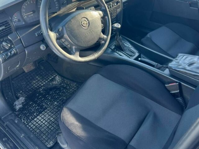 Серый Опель Омега, объемом двигателя 2.2 л и пробегом 326 тыс. км за 2000 $, фото 4 на Automoto.ua