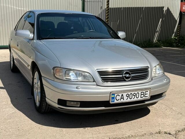 Сірий Опель Омега, об'ємом двигуна 2.2 л та пробігом 312 тис. км за 4555 $, фото 7 на Automoto.ua