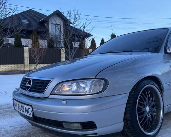 Сірий Опель Омега, об'ємом двигуна 3 л та пробігом 296 тис. км за 4000 $, фото 6 на Automoto.ua
