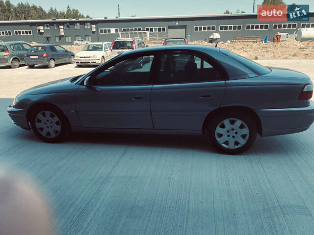 Серый Опель Омега, объемом двигателя 2.6 л и пробегом 368 тыс. км за 3600 $, фото 7 на Automoto.ua