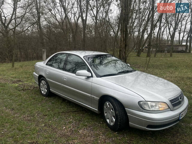 Серый Опель Омега, объемом двигателя 2.2 л и пробегом 206 тыс. км за 2900 $, фото 1 на Automoto.ua